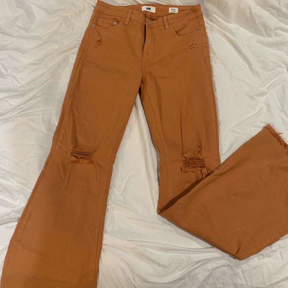 Burnt orange bell bottom jeans